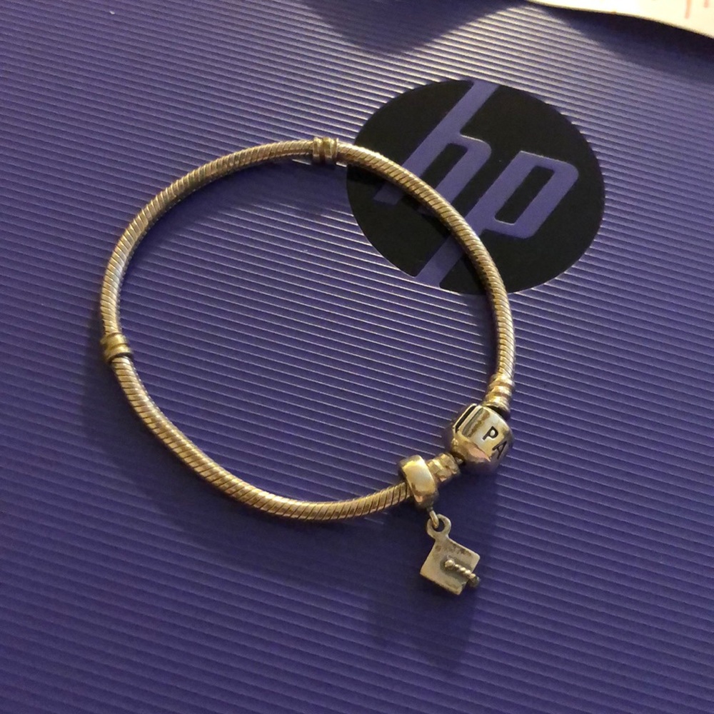 Pandora bracelet with graduation charm